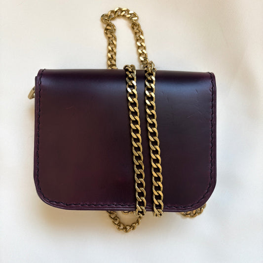 purple leather mini crossbody purse front view